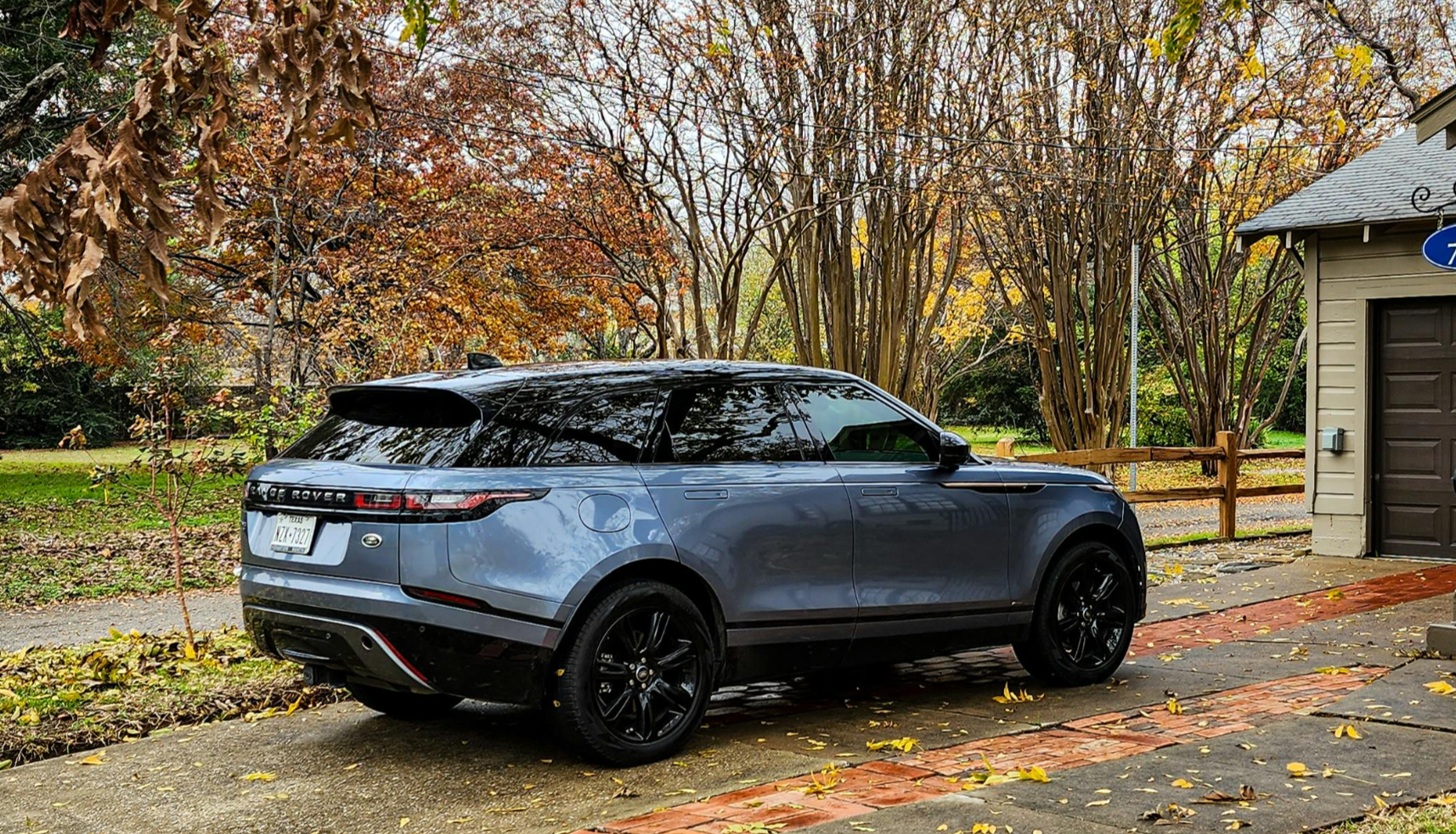 Pre-Owned Luxury SUV parked in a rural area in Texas